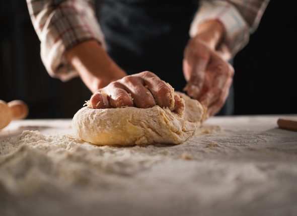 Baking,Concept.,Unrecognizable,Female,Prepares,Pastry,,Kneads,Dough,On,Wooden